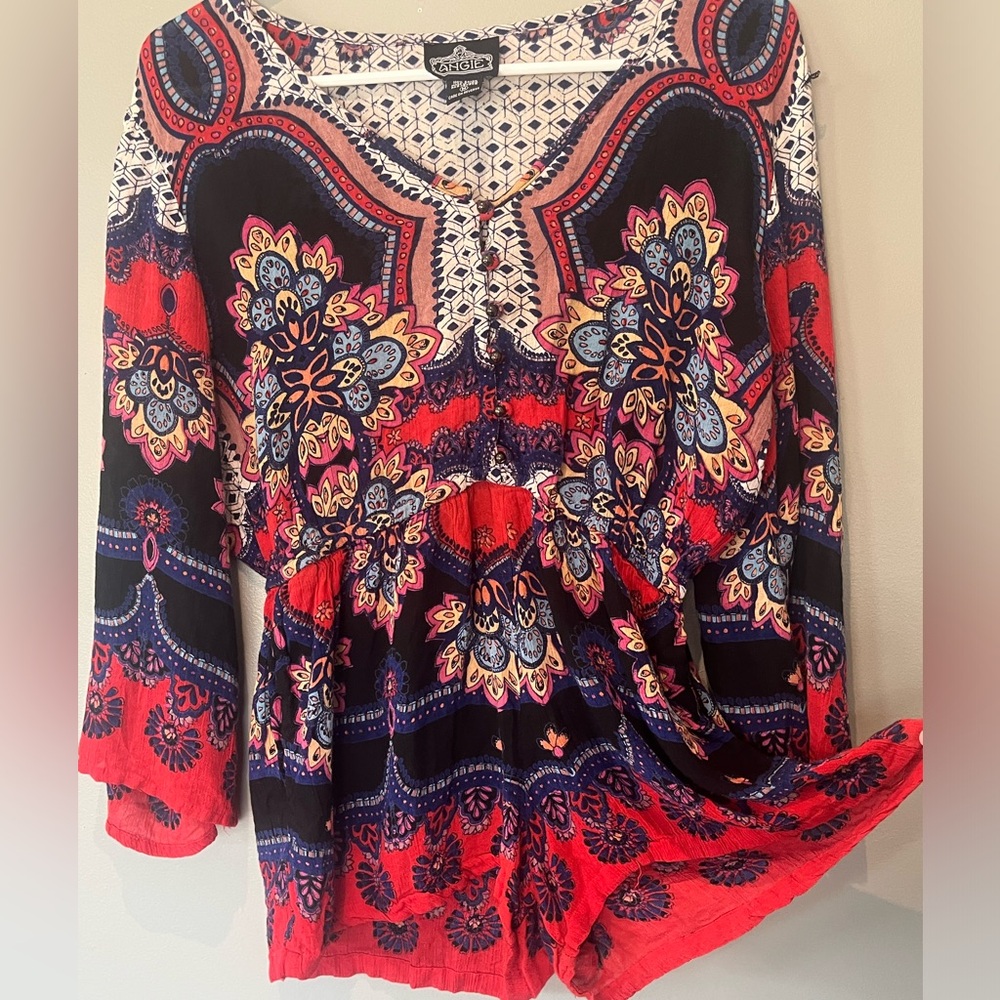 Adorable brightly colored romper by Angie